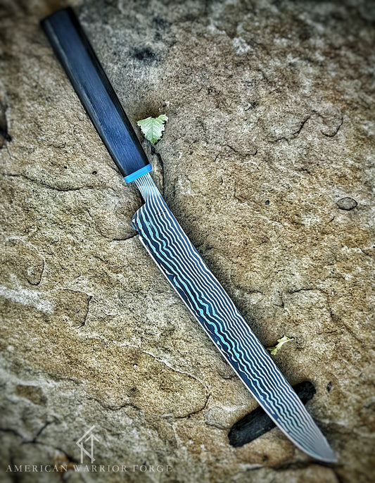 10.5” Slicer in “Eastern Waves” Damascus clad San Mai